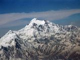 10 Nanga Parbat Rakhiot Face, Rakhiot Peak, Silver Saddle, East Peak, Silver Plateau, Summit, North Peaks On Flight From Islamabad To Skardu The flight around Nanga Parbat continues with Hermann Buhls route of first ascent becoming perfectly visible. Rakhiot Peak leads up to the Silver Saddle between the Nanga Parbat Southeast and East Peaks, and up to the summit with the North Peaks on the right.